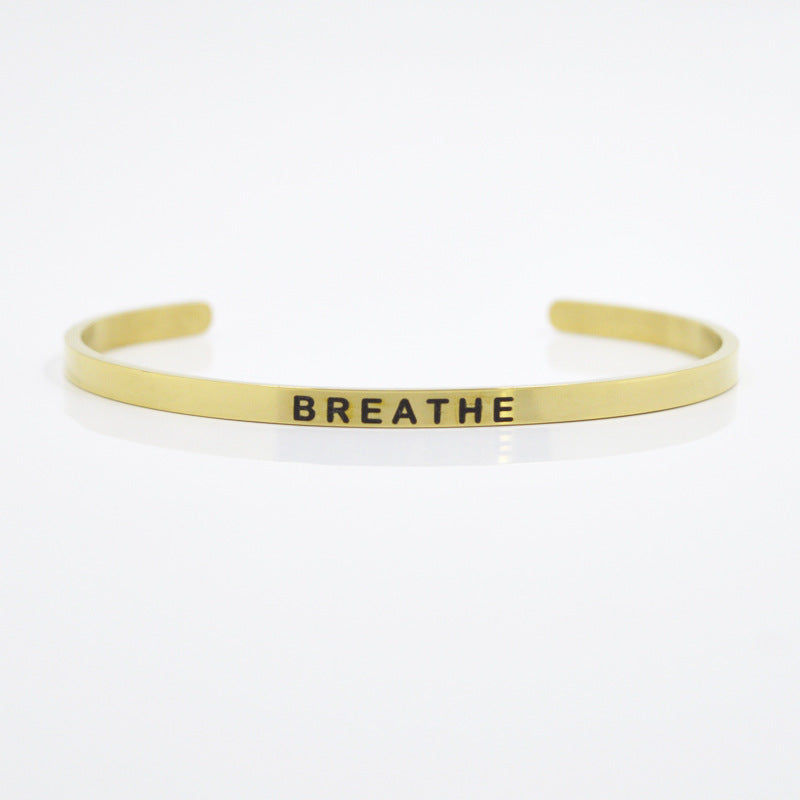 Letras de acero inoxidable de oro de 4 mm al por mayor titanio acero C Shape Breathe Dream Pulsera intrépida
